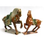 Two Chinese Tang style horses, one repaired, 42cmH and 37cmH (2)