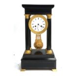 An ebonised and parcel gilt portico mantel clock, dial supported below pediment top, on four