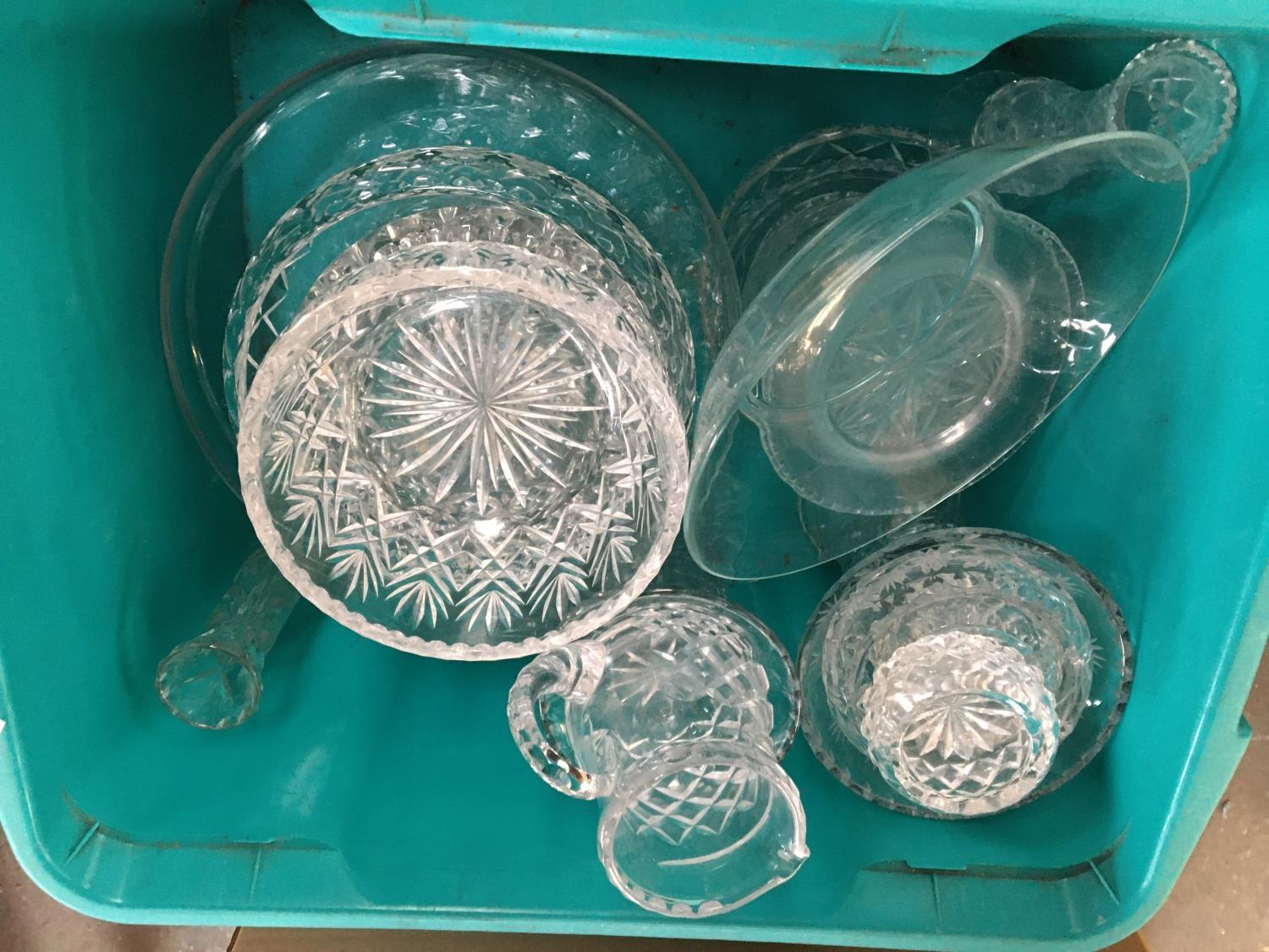 A mixed lot of glass and cut glass to include cake stand, vases, bowls, trinket dishes etc