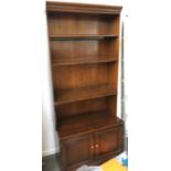 An open bookshelf above two cupboard doors, 86x198cmH