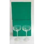 A set of four boxed Avon lead crystal glasses etched with hummingbird design with frosted stems