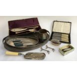A mixed lot of plated items to include butter knives, tankard, table lighter, and a quantity of