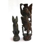 An Asian hardwood carved figure, 41cmH; together with a carved Egyptian deity, 29cmH (af)