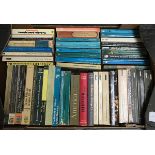 A mixed box of paperback books, some Pelican editions