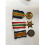 A collection of three WWI medals: British War Medal 1914-1918, Victory Medal, and the Italy Star