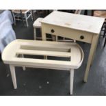 A white painted pine desk with blind drawer, 66cmW; together with a white painted cradle stand