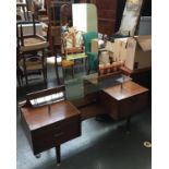 A mid-century dressing table, with adjustable long mirror, glass overshelf, above two sets of two