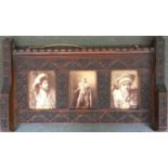 An ornately carved hardwood frame containing three photographs of the primary actors in Henry