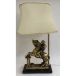 A brass table lamp ion the form of Napoleon mounted upon a horse, to top of shade 76cmH