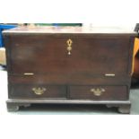 An 18th century mule chest, later converted with hinged fall front and two drawers below, on bracket