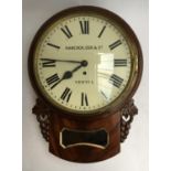 A drop dial wall clock, the dial 30.5cmD, marked Hancock, Cox & Co, Yeovil, within mahogany case