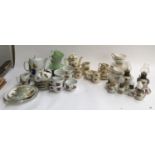 A Royal Doulton 'Old Leeds Sprays' coffee set; Royal Worcester Evesham coffee set and cake stand;