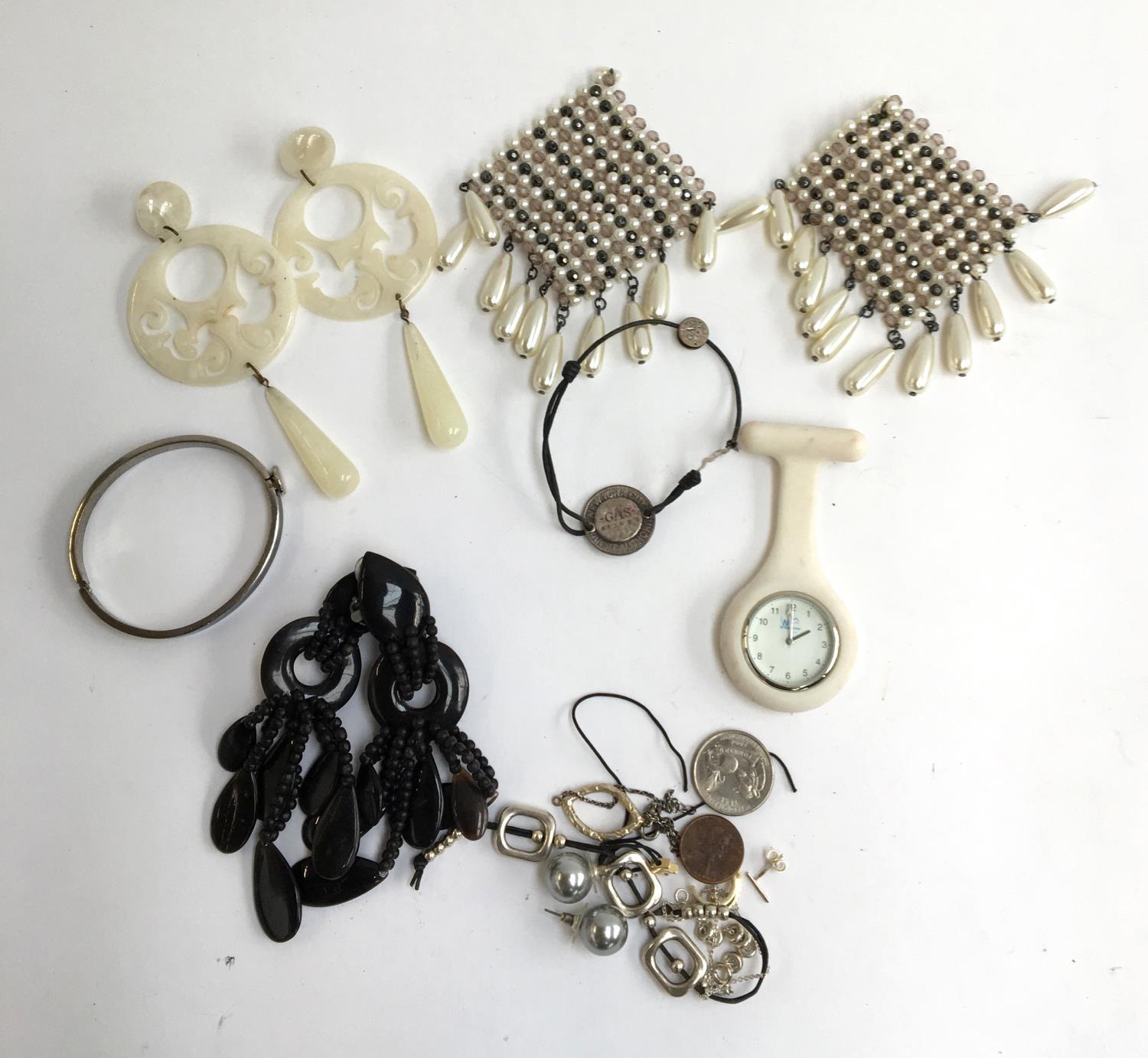 A mixed lot to include silver bracelet, earrings, modern fob watch and others