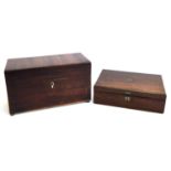 A 19th century mahogany tea caddy on brass bun feet, 27.5cmW; together with a small mahogany box,