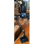 A Herbert Terry black anglepoise on stepped square base