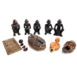 A collection of carved wooden African figures, together with a carved wooden trinket box with lizard
