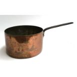 A very large heavy copper saucepan with handle, marked Leon Jaeggi, Kitchen Equipment, Dean Street
