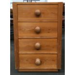 A pine bedside cabinet of four drawers, 48x45x73cmH