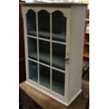 A painted glazed hanging wall cupboard, having two shelves, 54.5x26x80cmH