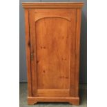 An early 20th century pine cupboard with shelves and hooks to interior, 74x43x137cm