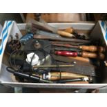 A mixed box of vintage hand tools, including saws, files, rasp, chisels etc