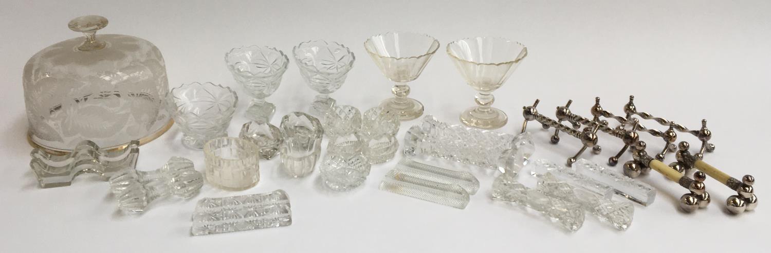 A number of cut glass items, to include domed food cover, seven pairs of cut glass cutlery rests,