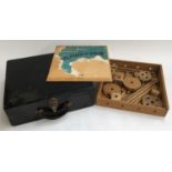 A black painted wooden artist's box; together with a vintage wooden building set