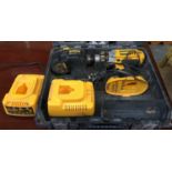 A DeWalt 18v cordless drill, with two charging packs