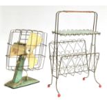 A 1950s magazine rack; together with a vintage electric fan