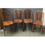 A set of four good 19th century wheelback kitchen chairs, two with maker's mark LH