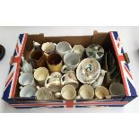 A large box of ceramics to include Doulton 'Willow' jug, commemorative mugs, Goss crested china,