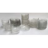 A good mixed lot of glassware to include fingerbowls, small plates, cut glass dishes, demilune