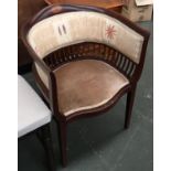 An early 20th century mahogany and marquetry captain's chair