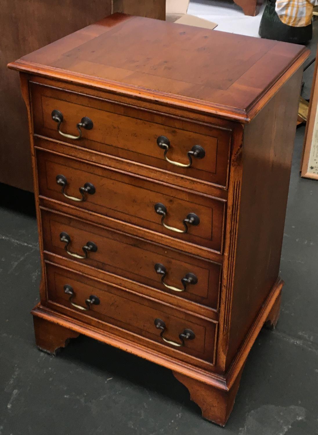 A walnut bedside cabinet, four drawers, labelled for Hallett & Son. ltd Weymouth, 47x36x72cmH