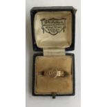 A Victorian 9ct gold memoriam ring with inset hair