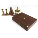 A mixed lot to include oak canteen (af); mechanical metronome; desk bell; candlesticks; brass