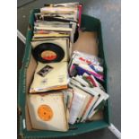 A mixed box of 7" singles, mainly '70s and '80s, pop, disco, and rock [banana box]