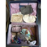Antler suitcase containing 3 clutch bags, two fans and other items
