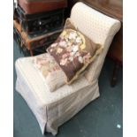 A 19th century upholstered bedroom chair with two needlework cushions