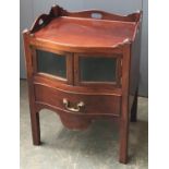 A Regency and later commode/bedside cabinet, converted, three quarter gallery above serpentine