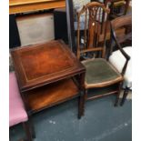 A square mahogany side table, with leather inset top and undershelf, on tapered legs, 51x51x69.5cmH;