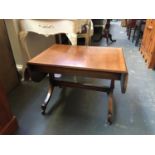 A small mahogany sofa table, on brass casters, 70cmW