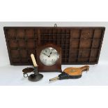 A mahogany cased mantel clock with key; together with a small set of fire bellows; candlestick