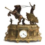 A German brass mantel clock, surmounted by Boudica in a horse drawn chariot, movement by 'FHS