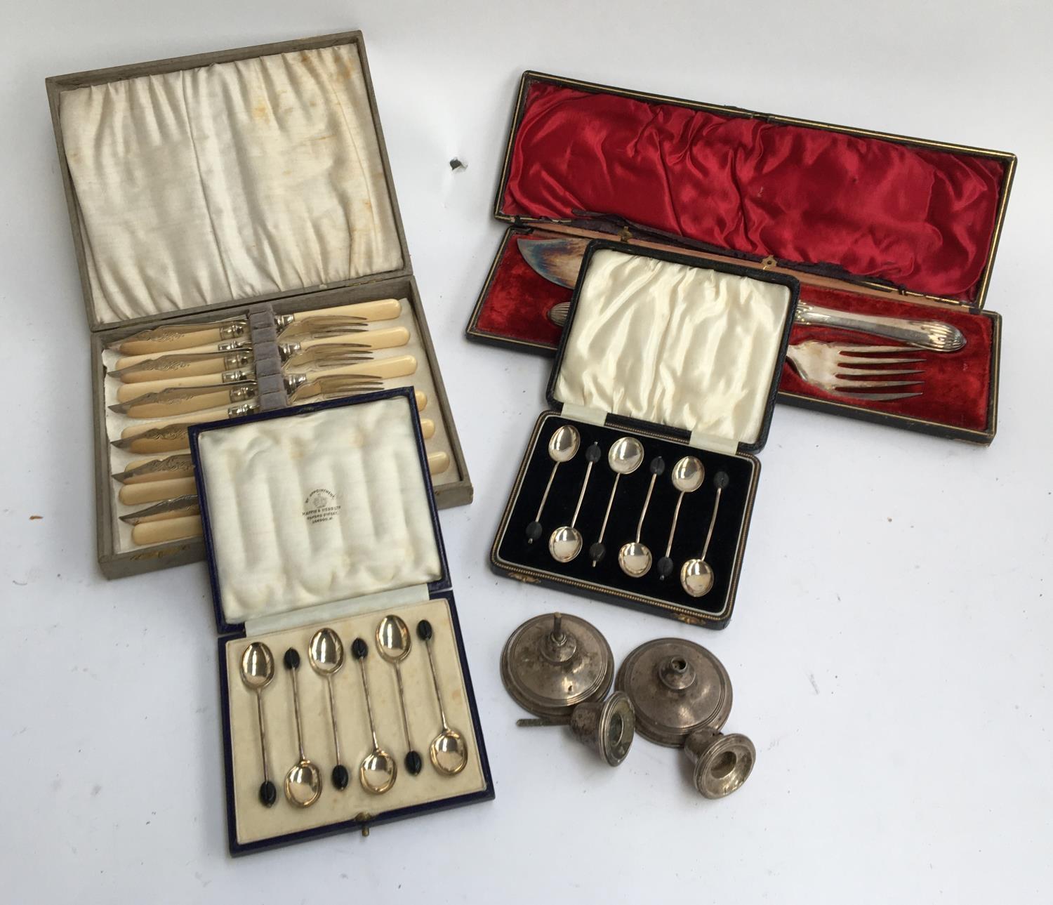 A cased set of six silver coffee bean terminal coffee spoons by Mappin & Webb, together with a