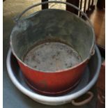 An early 20th century galvanised aluminium bucket, 36cmD; and aluminium pan (2)