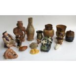 A mixed lot of ceramics to include Doulton Lambeth ware, some tourist pieces, Majollica heron wall