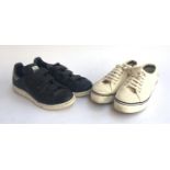 A pair of Adidas Stan Smith trainers, together with a pair of Fred Perry trainers, both UK size 5