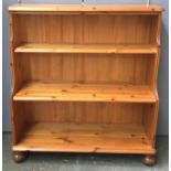 A modern pine waterfall bookcase, 96cmW