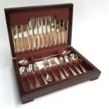 A fitted canteen of flatware in hardwood case